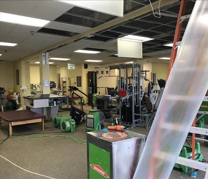 SERVPRO dealing with a water loss at a gym