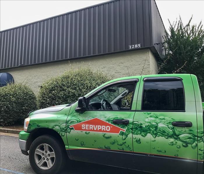 SERVPRO truck parked in front of a Suwanee business.