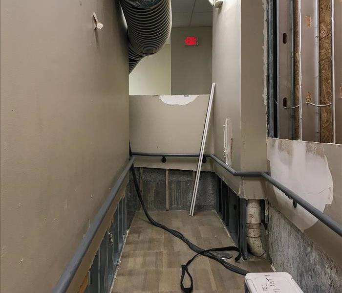 Flood cuts and large vent to dry water in a Buford, GA business