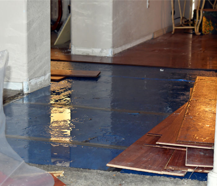 Water Damaged Floor Being Removed