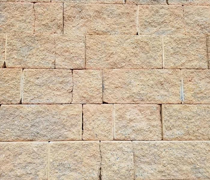 Sand color cracked retention wall blocks and bricks